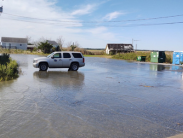SUV surrounded by flood water in Mispillion Harbor