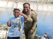 A mother and son experience success at an earlier Take A Kid Fishing! event at Dover's Silver Lake 