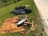 Trash and construction debris illegally dumped along Interstate 495 in Wilmington