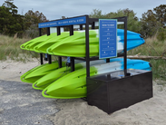 A paddle kiosk at Towers Bayside allows visitors to rent a kayak, paddle and life vest through the internet.