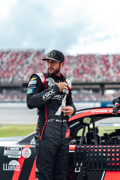 image of Chase Elliot with race car