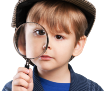 Young Child holding Magnifying glass
