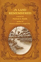 A Land Remembered by Patrick D. Smith Framed image of swamp land with steer horns under image and scroll onrmanent at edge of cover.