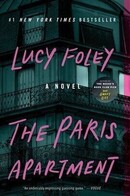 Book Cover-The Paris Apartment by Lucy Foley Image view of upper floors of an apartment building 