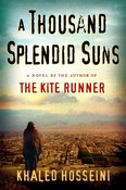Book Cover: A Thousand Splendid Suns by Khaled Hosseini Image: Person on hill overlooking town with mountains in the distance