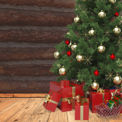 Christmas tree in front of log wall