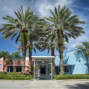 North Greenwood Rec Center with palm trees in front