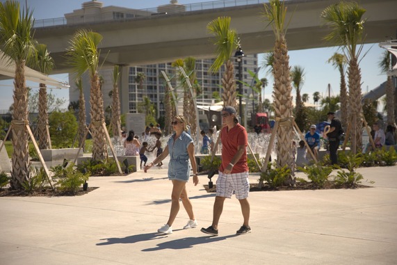 people walking throughout the park