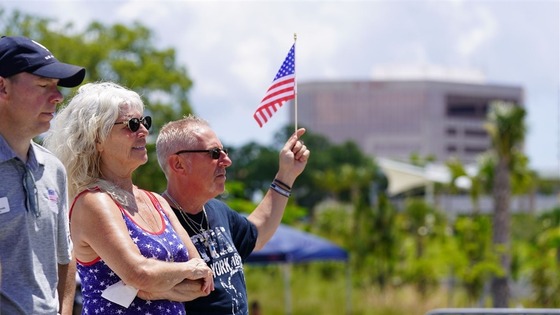 holding a flag