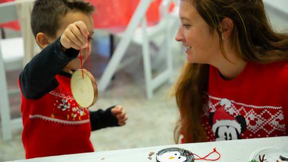 kid making ornament