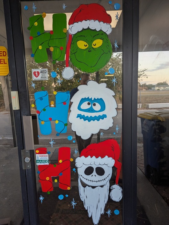 City Employee Paints Utility Doors