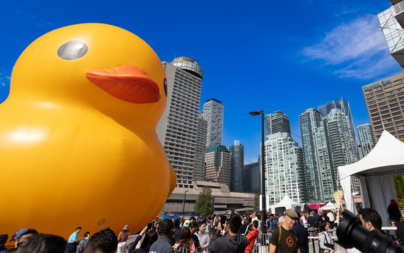 worlds largest duck in a parking lot