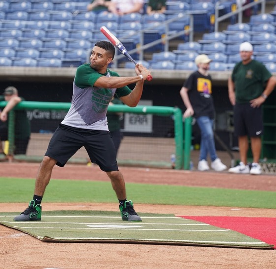 Police Charity Softball game player at baseball diamond