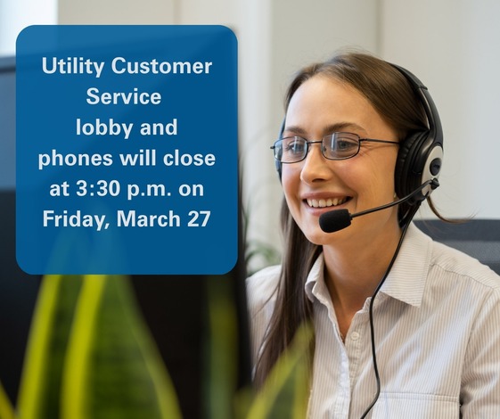 woman with headset on computer providing customer service