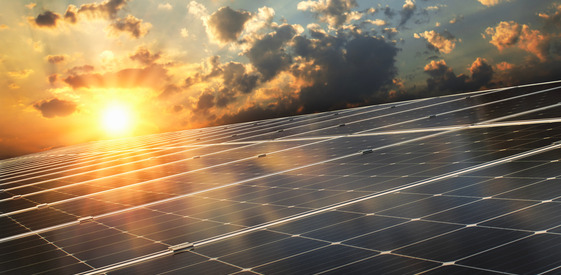 Solar Panels with sun in background