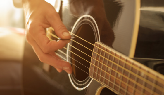 Image of Man Playing Guitar