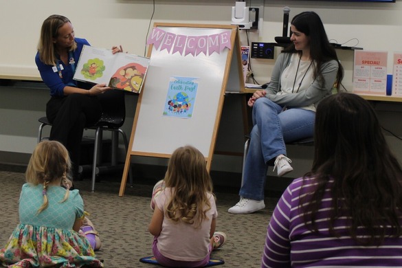 Clearwater staff reading to children at Earth Day Storytime