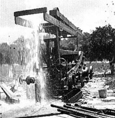 Photo of a flowing artesian well - Palatka, Florida taken by E. H. Sellards