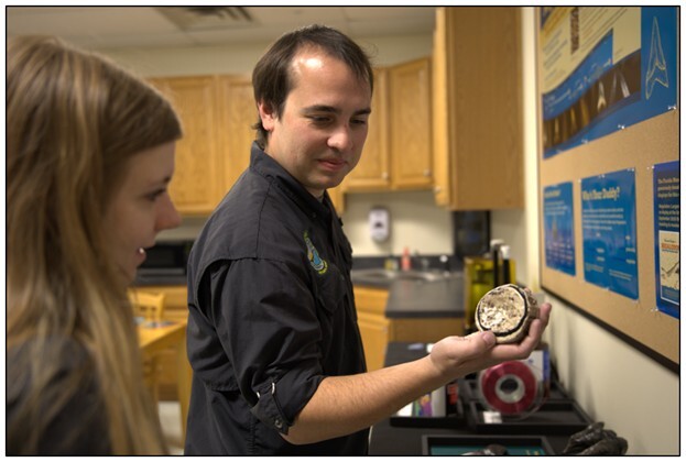 Figure 7. Nick Hall (author) with a printed megalodon vertebral centrum.