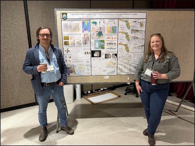 Figure 5. Gary Fowler and Mary Beth Lupo in front of their poster at the Earth MRI Workshop.