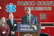 Florida's Surgeon General speaks to an audience at the CORE expansion in Pasco County