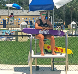 pool lifeguard in chair