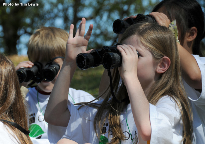 Children with binoculars