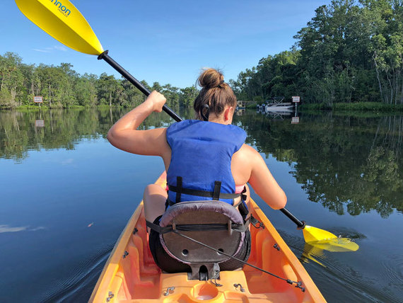 kayaker wearing pfd