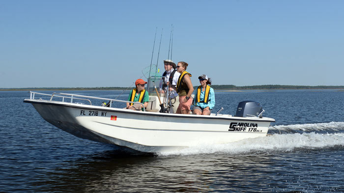 family on boat