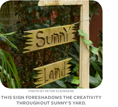 This "Sunny Land" sign foreshadows the creativity throughout Sunny’s yard.