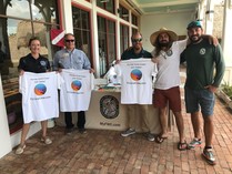 Coral Crew volunteers display their tee-shirts 