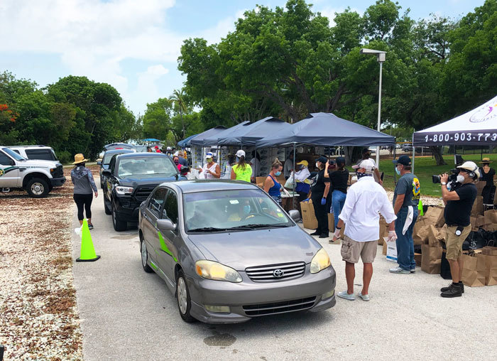 Officer Dube talking with Congresswoman Debbie Mucarsel- Powell