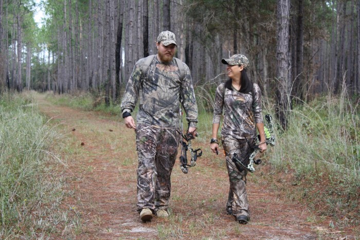 hunters walking in woods