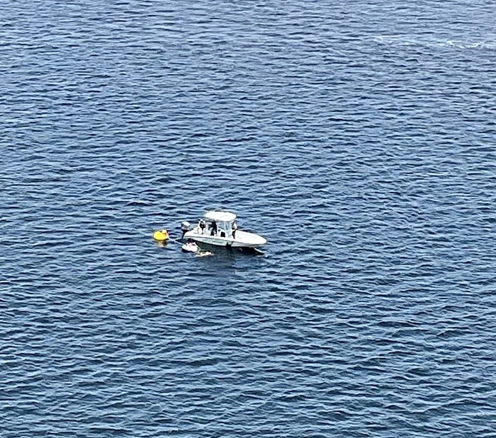 FWC vessel rescuing swimmer
