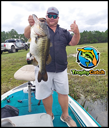 Angler with trophy bass