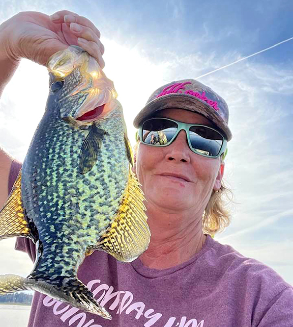 Angler with crappie