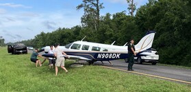Plane being pulled off Highway 50