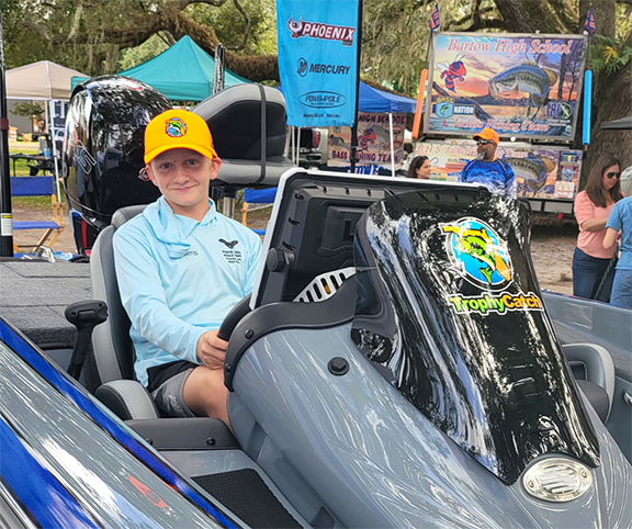 Youth angler in Phoenix bass boat