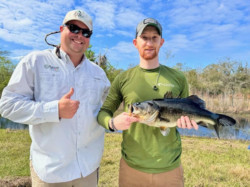 Florida Youth Conservation Centers Network Regional Coordinator, Keaton Fish with Project WILD participant Aaron Gross