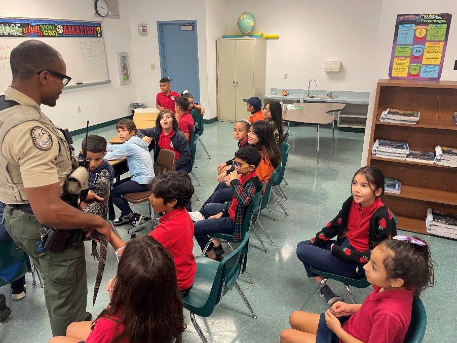 FWC Law Enforcement officer presenting at a school in Miami-Dade