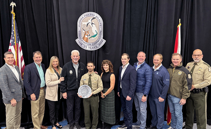 Pietroburgo accepting award from Commission