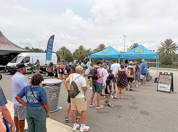 TrophyCatch tents and crowd at Coke Zero 400 race