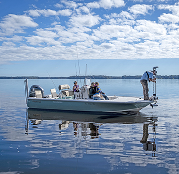 Family fishing in boat