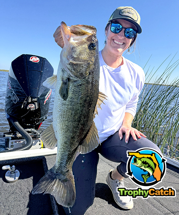 Angler with trophy Florida bass, TrophyCatch logo