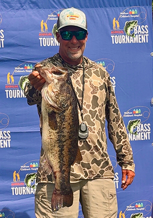 Angler with trophy Florida bass