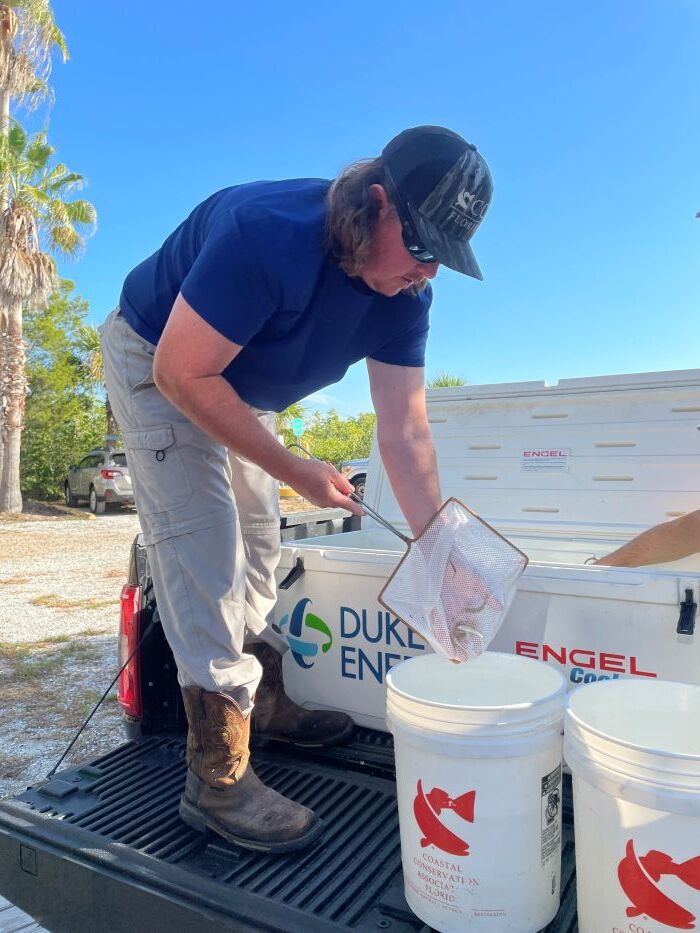Man Delivering Hatchery Fingerlings