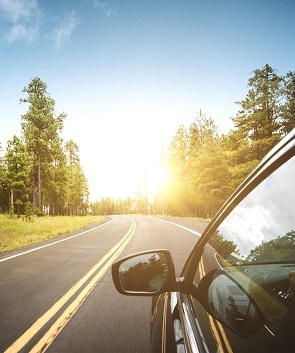 car driving on scenic road