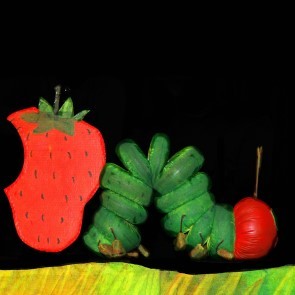 green catepillar with strawberry