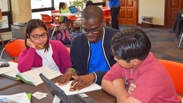 Tutoring session with teach and two students