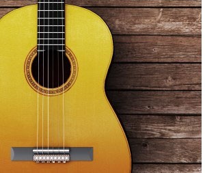 guitar on wooden background